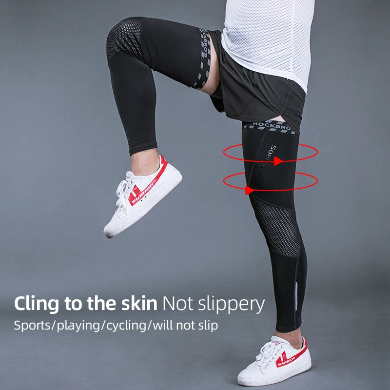 Black thermal leg warmers with snug long fit and mesh calf panels