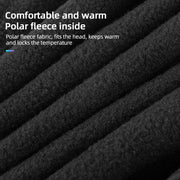 Black polar fleece-lined thermal skull cap fabric close-up, textured surface