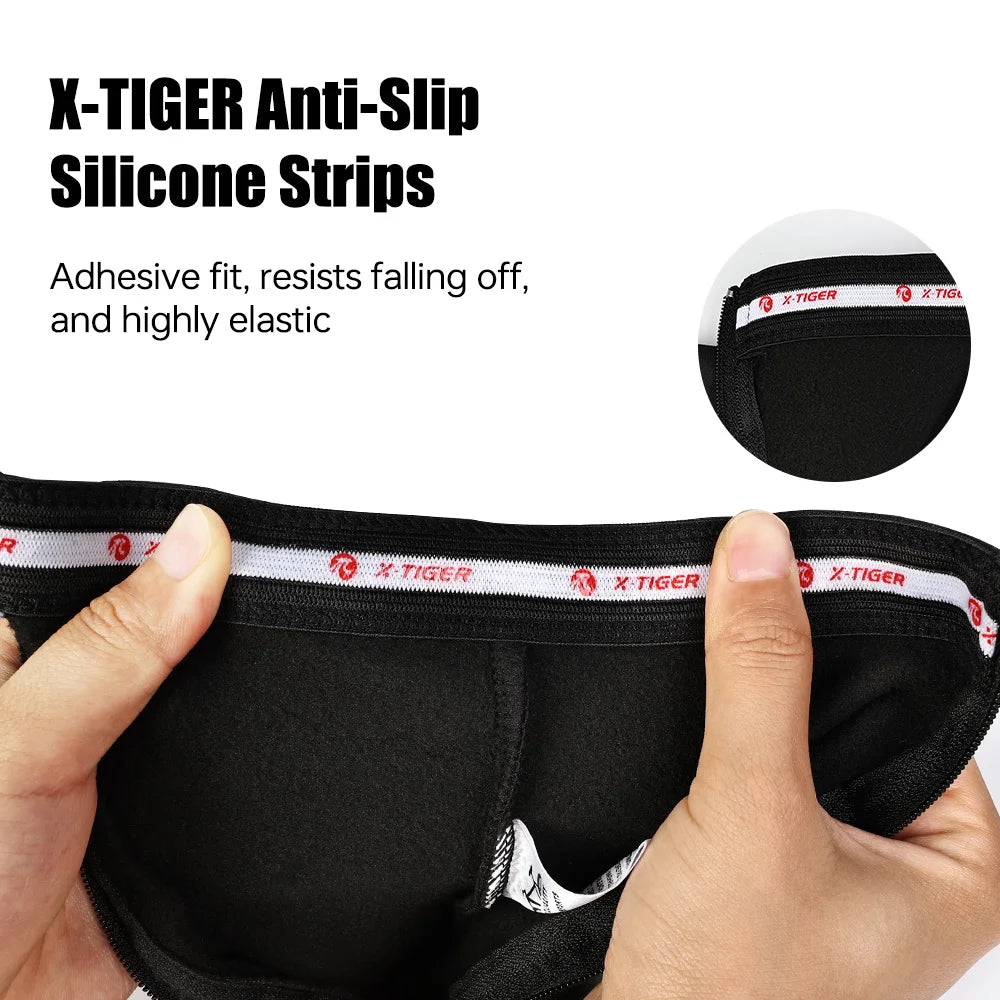 Black shoe cover with anti-slip silicone strips along the top hem, close-up